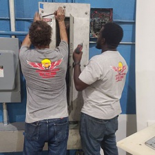 Electricians Repairing Electrical Box in Broward County and Miami-Dade County, FL