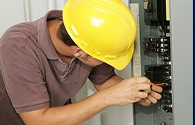 Electrician Performing Electrical Repairs on Breaker Box in Southwest Ranches