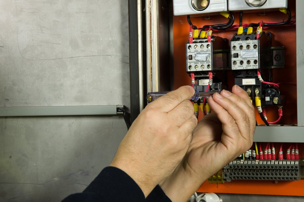 Licensed Electrician working on breaker box in Fort Lauderdale